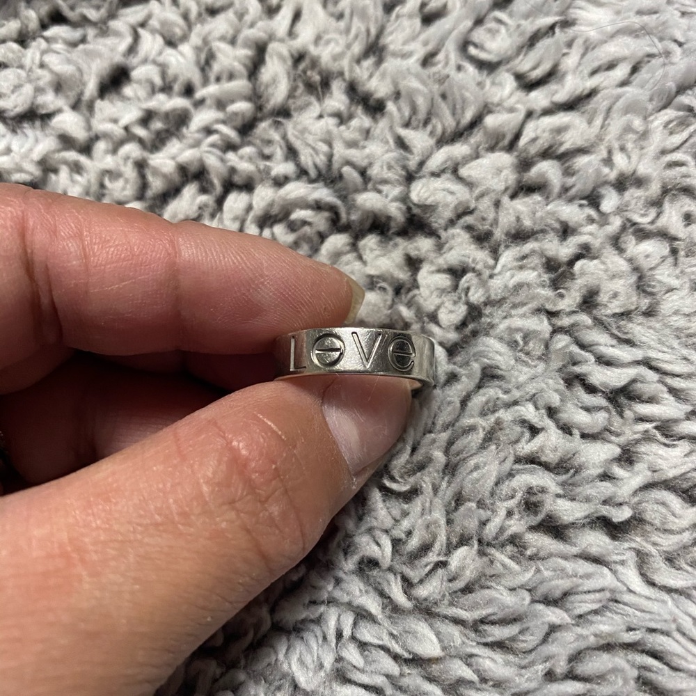 Authentic Cartier love (spelled out) ring